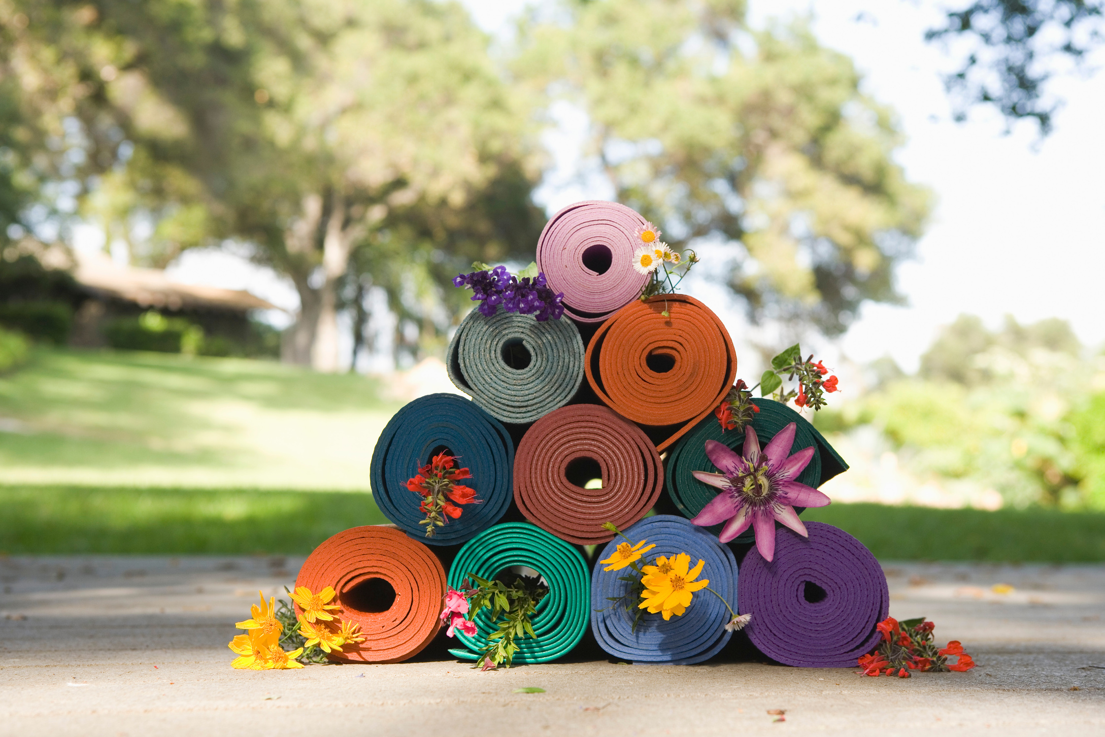 Stacked rolled yoga mats